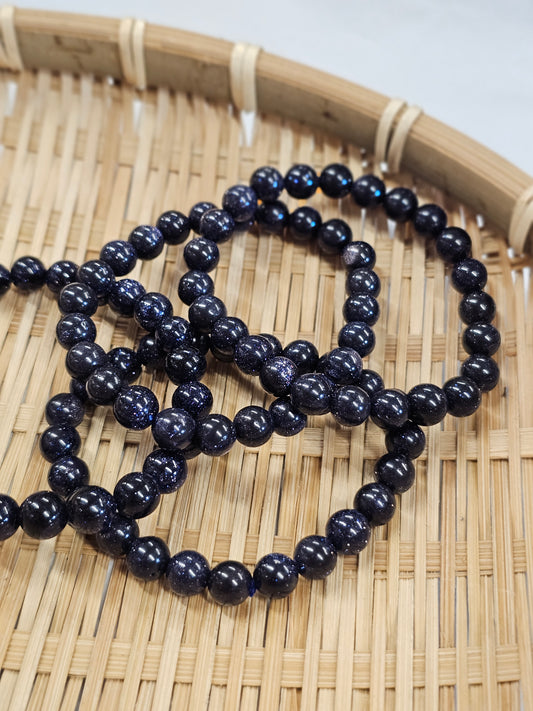 8mm Blue Goldstone Bead Bracelet